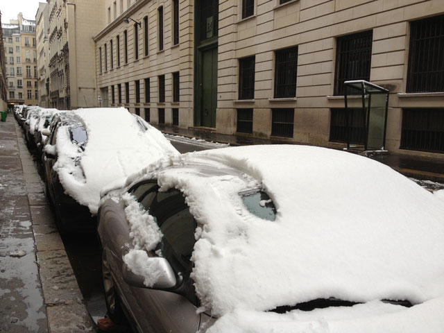 Snow on the cars in our street