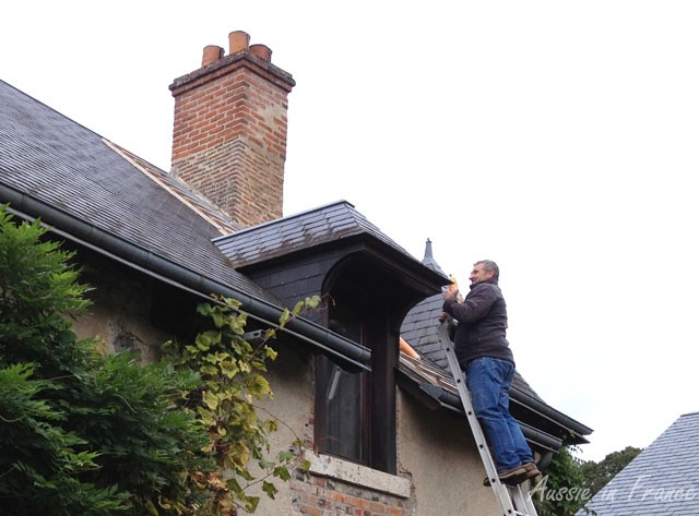 Mr B. taking his spray cans up the ladder