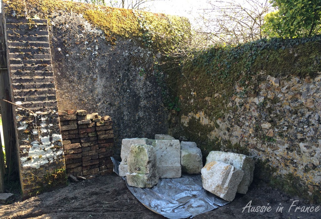 My stack of bricks next to the first lot of freestone blocks