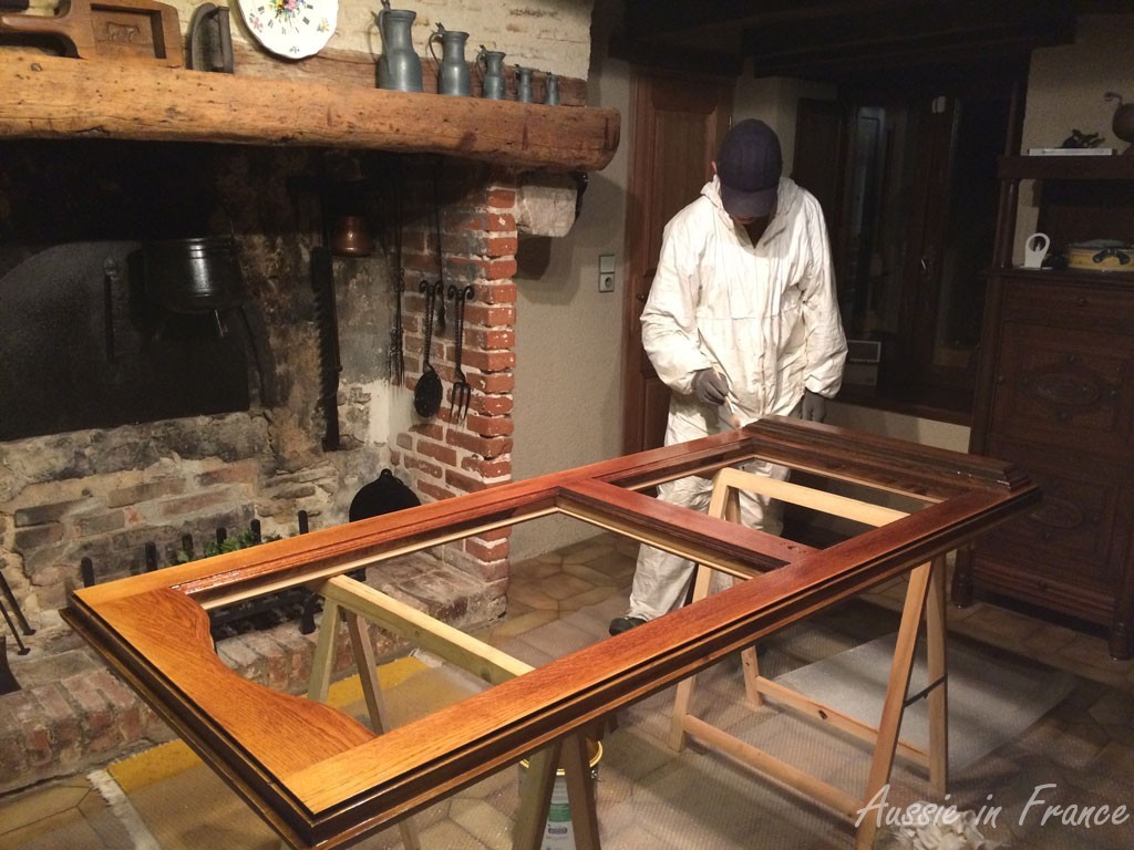 Staining the door in the kitchen out of the cold