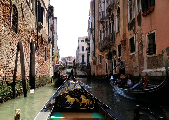 Three gondolas at once and the gondoliers are all calling out to each other