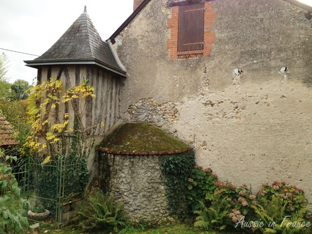 The half-timbered tower and back of the bread oven taken from the vegetable patch