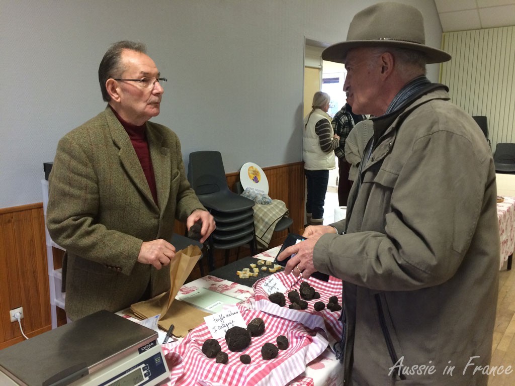 Jean Michel buying our two truffles