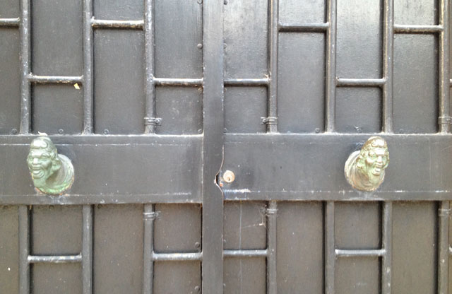 Metal door with decoration