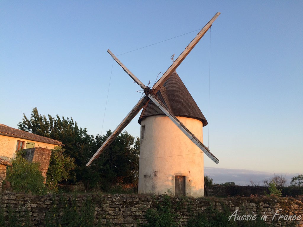 Old windmill at sunset