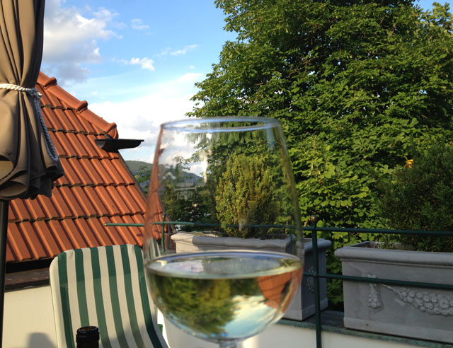 A glass of wine on the terrace in Austria